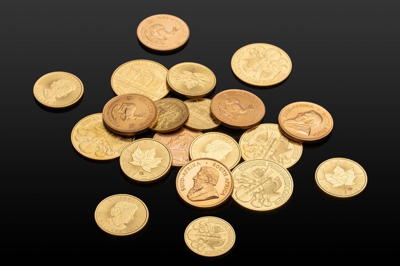 Gold bullion coins appraised and weighed at Estate Buyers Delray Beach